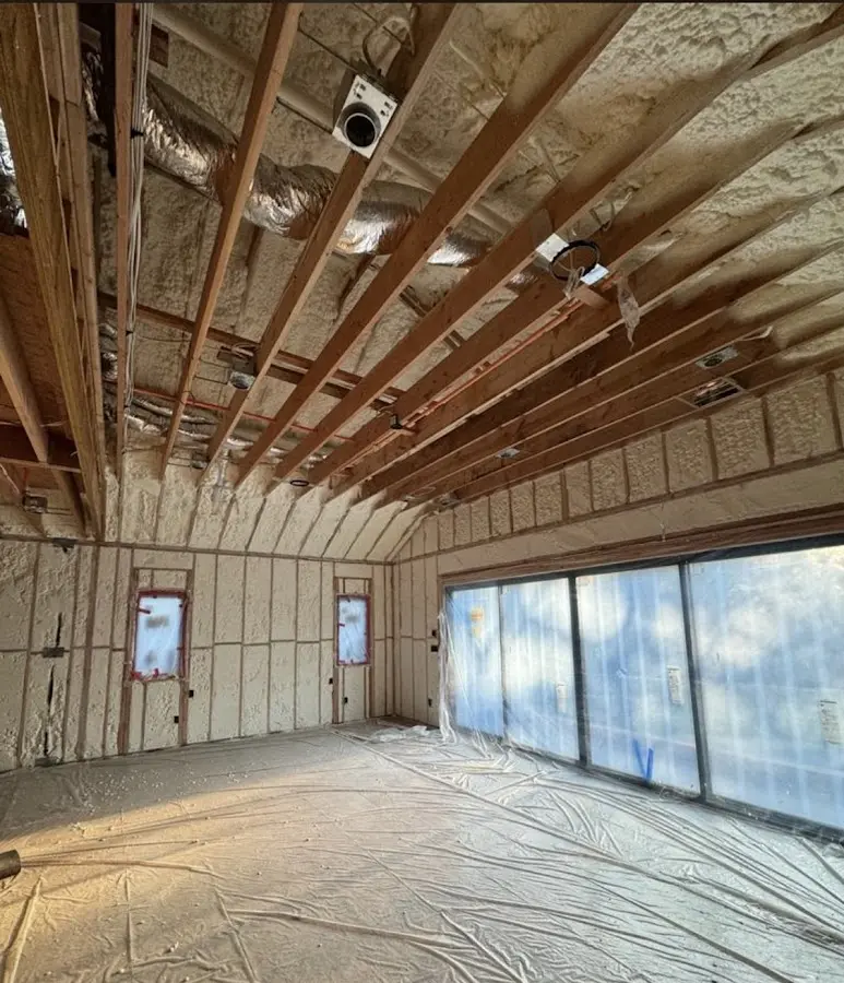 Interior walls and ceiling insulated with spray foam during new construction in Saks
